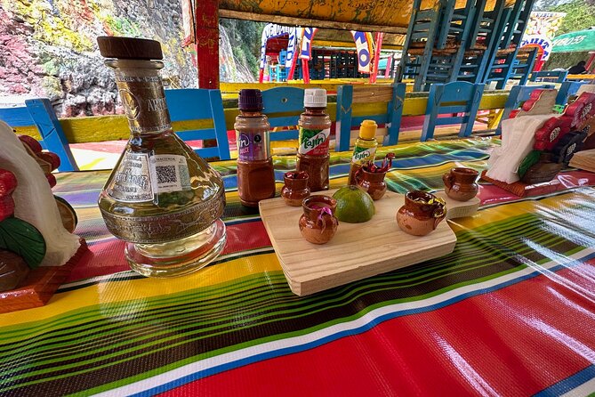 Boat tour in Mexico City with Live Guide with Food and Drinks - Drinks, music, and the return ride