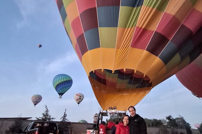 Flight in Globe, visit archaeological area, breakfast and transport - Pulque and mezcal workshops add a local stop