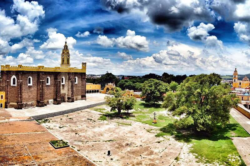 From Mexico City: Puebla and Cholula Day Tour - Transport, group size, and bilingual guiding