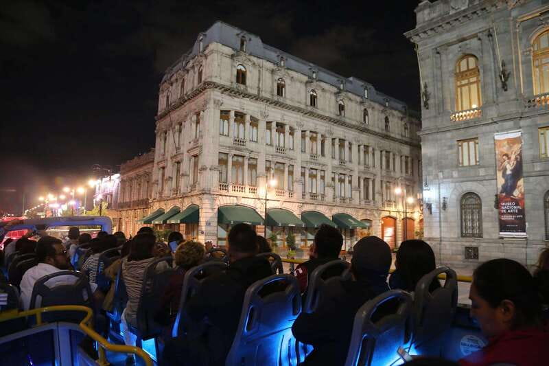 Mexico City: Night City Tour in a Double Decker Bus - Finding the red bus beside the cathedral