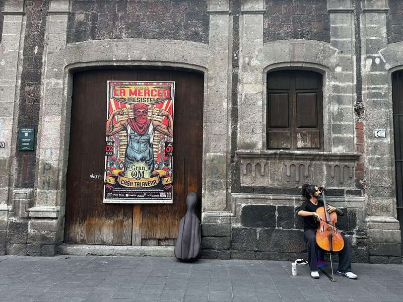 Mexico City: Old Town Food Tour of 7 Tastings & Secret Dish - Mole-covered enchiladas and the work behind the sauce