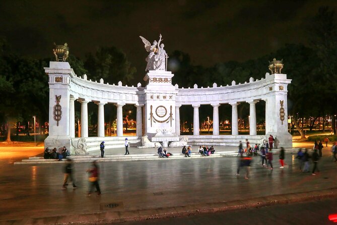 Night Tour of Mexico City Panoramic Ride on a Double-Decker Bus - Upper deck views, cold air, and rain